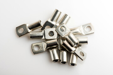 Crimp terminals for electrical wires, tools for electricians. electrical terminals, electrical installation work on white. Connectors for wires.