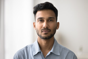 Young businessman. Head shot portrait profile picture at social media handsome bearded casual...