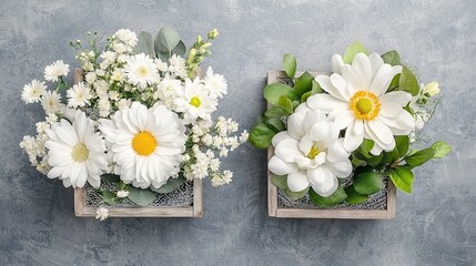 Fototapeta premium Two boxes, wooden, filled with white flowers stacked atop a blue wall near a planter brimming with yellow and white blossoms