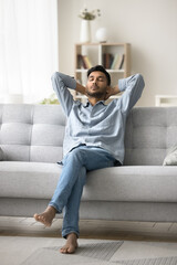 Tranquility and mindfulness. Vertical shot young man tired after work enjoy serene moment on...