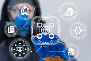 Worker using virtual touch screen push icon: global computer network. Industry networking...