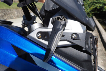 Broken turn signal on motorcycle.