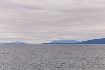 Ocean View With Cloudy Skies and Distant Coastline Scenery
