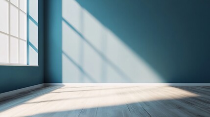 Obraz premium Sunlight illuminating empty room with blue wall and wooden floor