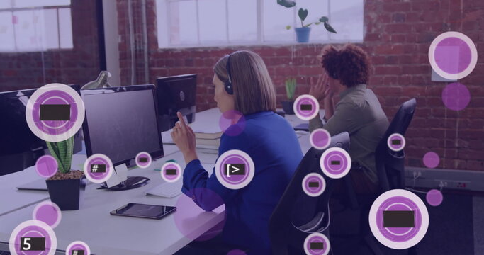 Image of 5g texts over diverse colleagues using phone headsets in office