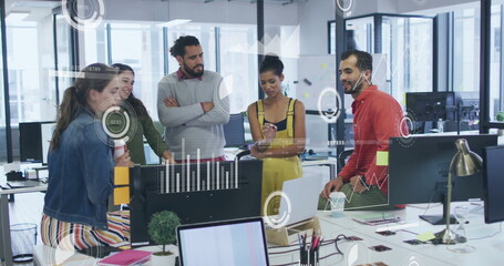 Image of financial data processing over diverse business people in office