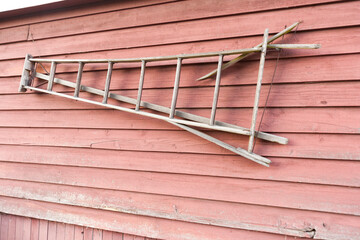 An old ladder on a wall