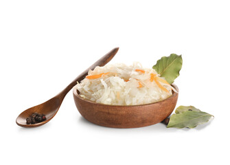 Bowl of tasty fermented cabbage with bay leaves and peppercorns on white background. Closeup