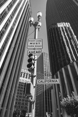 Black and white city skyscrapers and street light