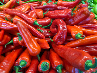 Raw cayenne pepper on a supermarket counter.