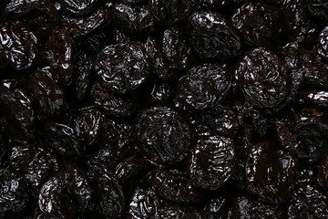 Texture of dried prunes as background
