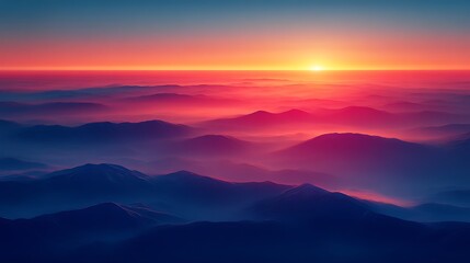 Obraz premium Vibrant sunrise over misty mountains.