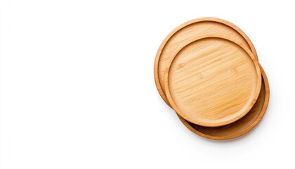 Stacked wooden plates on a white background, showcasing natural texture and simplicity