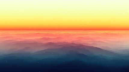 Obraz premium Vibrant sunset over misty mountains.