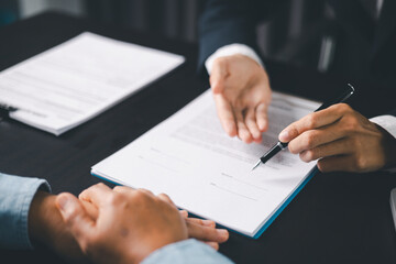 Business people signing contract making deal with life insurance agent Concept for consultant...