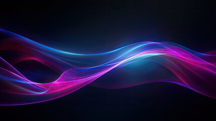Abstract flowing waves of light in vibrant colors on a dark background.