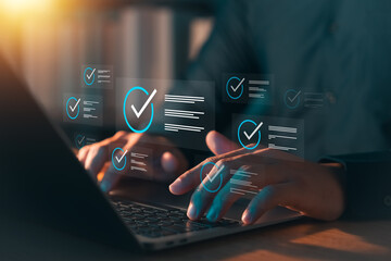 Concept of business performance tracking and evaluation, businessman using laptop to do online...