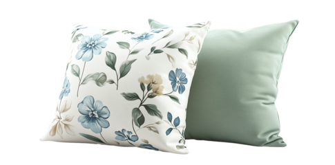 Two decorative pillows with floral and geometric patterns, isolated on transparent background.