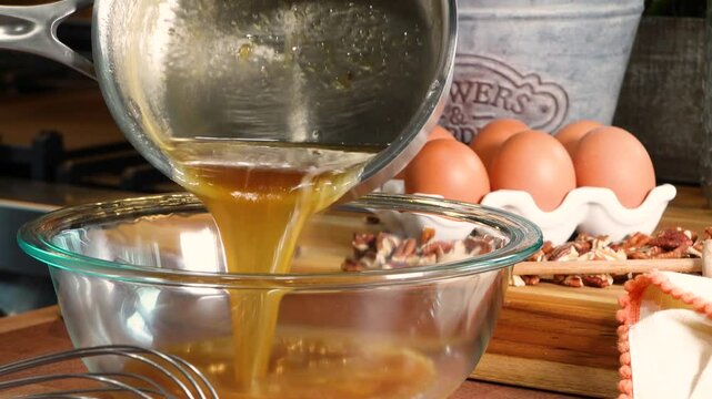 Baking sweet Honey Bars dessert squares.  A delicious snack made of fresh ingredients like flour, sugar, pecans and honey.  Baked to perfection in our rustic kitchen. 