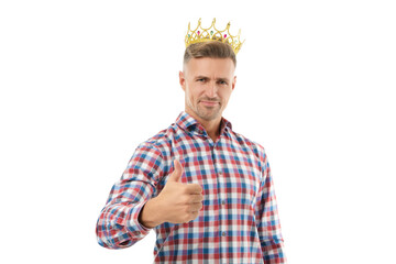 Successful and selfish egoist man is proud of himself and showing thumb up wearing checkered shirt...