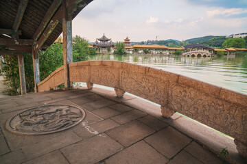 Fototapeta premium An ancient building complex and sunset scenery on the Taihu Lake Lake in Wuxi, Jiangsu Province, China will be on June 3, 2024
