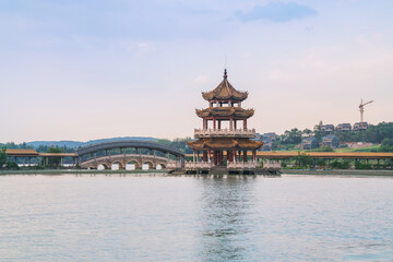 An ancient building complex and sunset scenery on the Taihu Lake Lake in Wuxi, Jiangsu Province, China will be on June 3, 2024