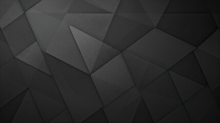 Fototapeta premium A textured black geometric background with various angular shapes and shades.