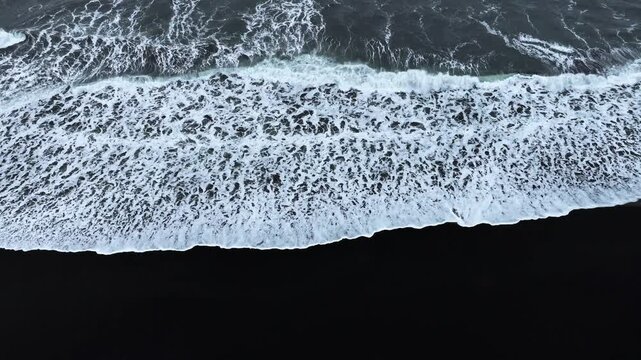 Abstract pattern in nature, Aerial view of black sand volcanic beach with crashing waves, Surreal nature drawing, Serene and tranquil landscape, Famous landmark of Iceland