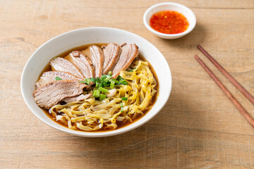 egg noodles with stewed duck in brown soup