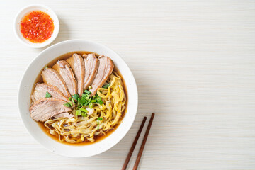 egg noodles with stewed duck in brown soup