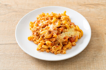 homemade macaroni bolognese with cheese