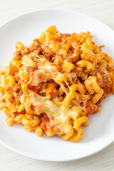 homemade macaroni bolognese with cheese