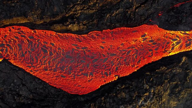 Lava river from active volcano, panoramic aerial view, epic pattern. Iceland. 2023.
