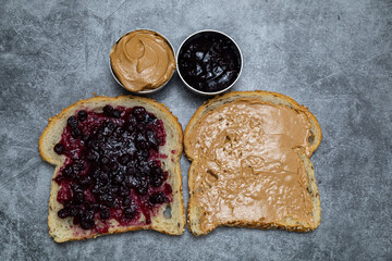 Peanut butter and jelly on sliced bread.