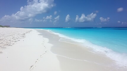 Serene Beach with Gentle Waves and Footprints in Sand