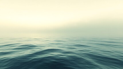 Obraz premium Serene Ocean Waves Under a Misty Sky