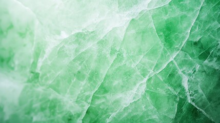 Close up view of green and white textured wall with jade stones in natural lighting