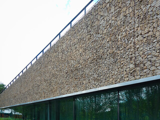 Architectural elements like walls and fences with diverse designs defining exterior and interior...