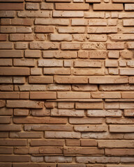 Fototapeta premium The brick wall is composed of variously sized rectangular bricks.