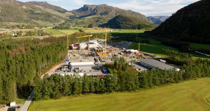 Construction Of Land-based Salmon Farm In Aardal, Norway. aerial orbiting shot