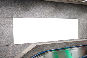 Mockup Blank Billboard display on the wall in subway train station.