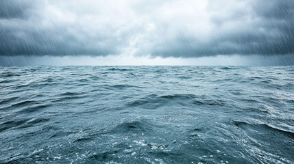 Dramatic ocean view with storm clouds and rain approaching sea