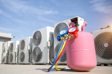 Measuring manifold gauge on air conditioner refrigerant tank for heat and conditioning HVAC system...