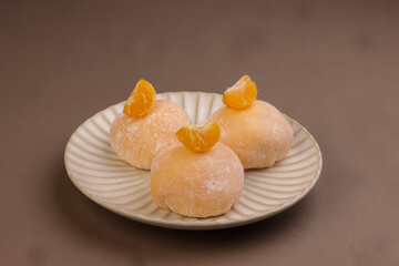 Orange Traditional Japanese Daifuku Mochi Dessert. 