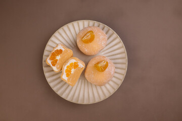 Orange Traditional Japanese Daifuku Mochi Dessert. 