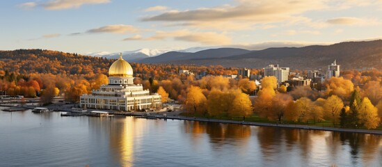 Fototapeta premium Golden Dome Temple by the Lake in Autumn