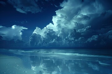 Serene Nighttime Seascape with Dramatic Clouds Reflecting on Calm Waters Under Moonlight