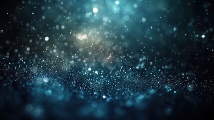 Fototapeta premium Abstract blue sparkle background with bokeh lights.