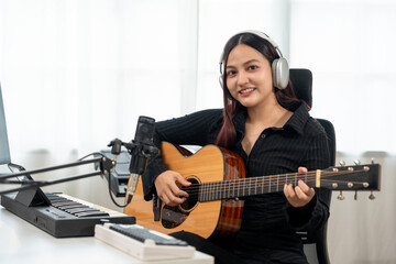 Professional Musician with condenser microphone and tablet for Mixing Mastering music. Music...