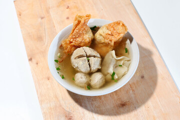 Bakwan Malang or Bakso Malang, traditional food from Malang, Indonesia. Meatball soup is served with other foods